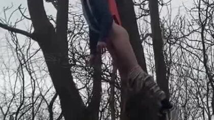 wedgie boy hanging in the forest